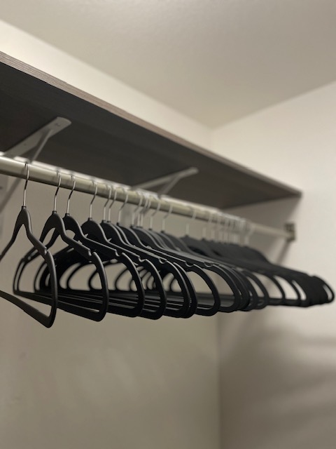 empty hangers in closet